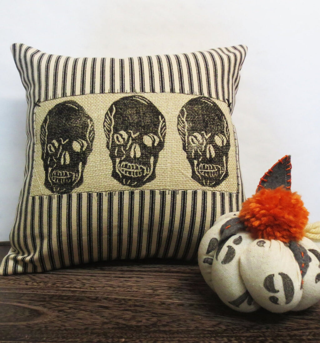 Skull Throw Pillow: Black & Ivory Ticking Stripe, Reverse Applique