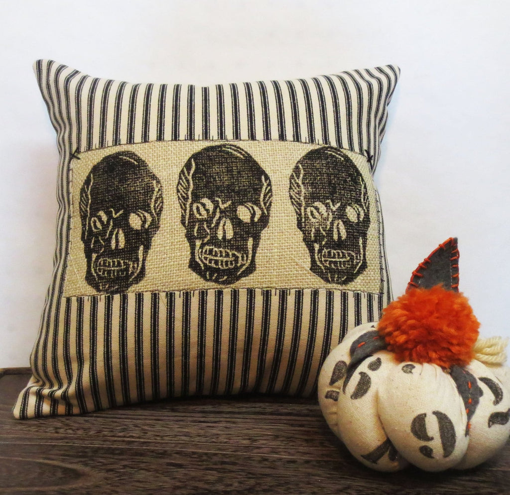 Skull Throw Pillow: Black & Ivory Ticking Stripe, Reverse Applique