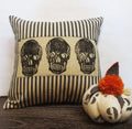 Skull Throw Pillow: Black & Ivory Ticking Stripe, Reverse Applique