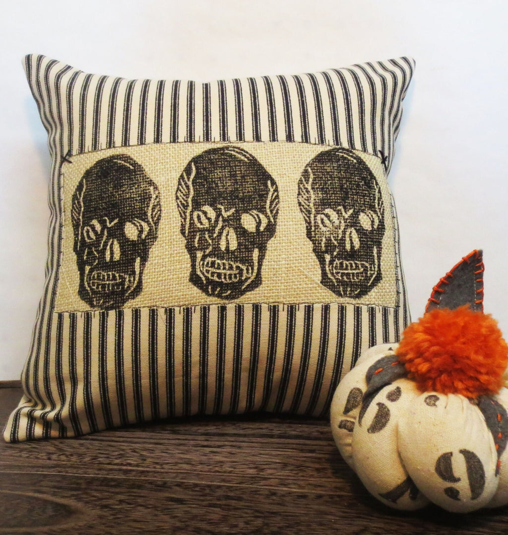 Skull Throw Pillow: Black & Ivory Ticking Stripe, Reverse Applique